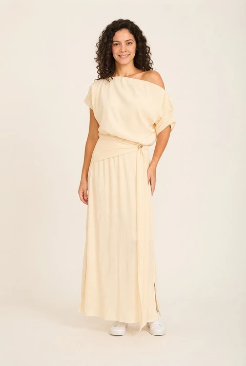 The same AI sample model wearing a champagne dress in a real Wearbly Try-On result